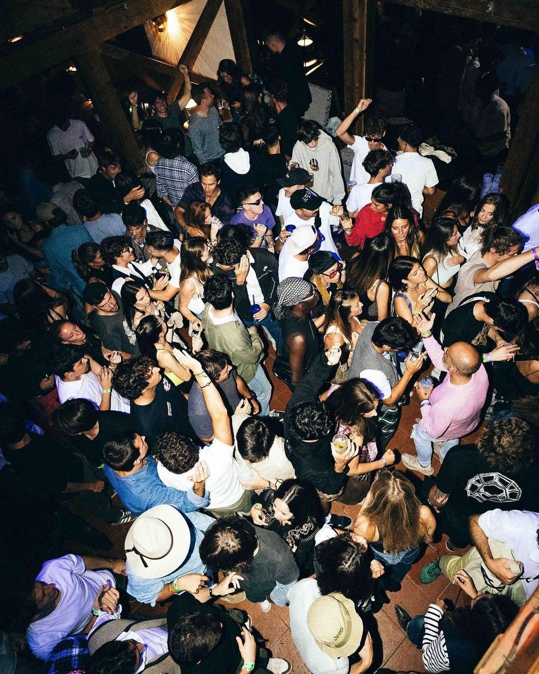 Aerial view of crowd in wooden venue